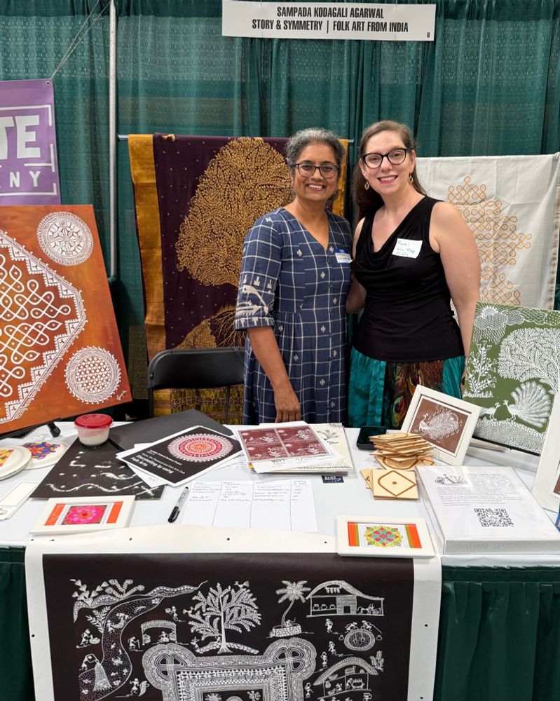 Me with Sampada Agarwal, an Indian Folk artists who is working with United Arts in Wake County and the surrounding areas. We are standing in a booth with some of her amazing art displayed.
