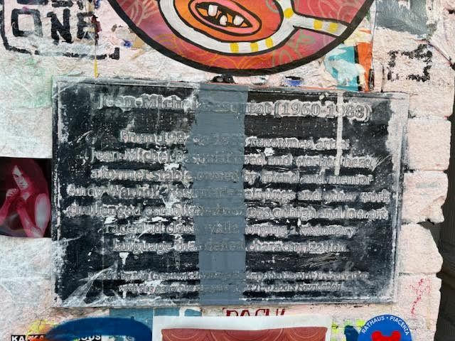 Some painted over the memorial plaque for onetime tenant Jean-Michel Basquiat, who lived and worked at 57 Great Jones from 1983 to the time of his death in 1988...
