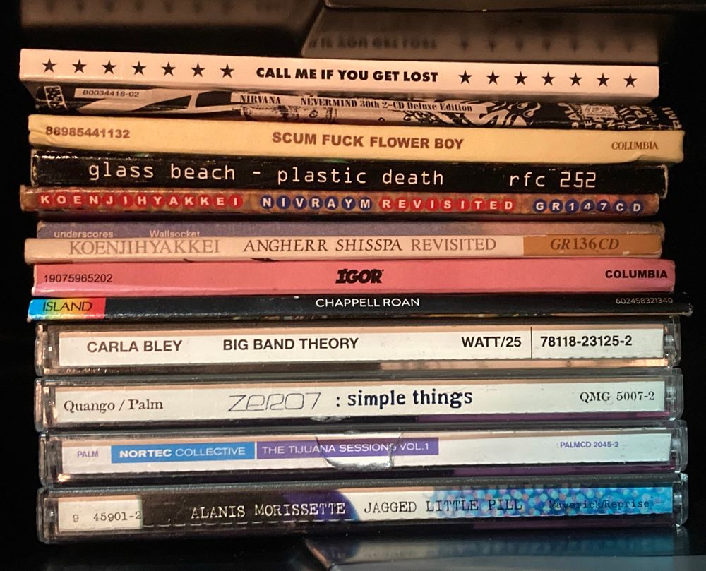 cd cases in my cars center console

call me if you get lost
nevermind
scum fuck flower boy
glass beach plastic death
koenjihyakkei nivraym 
underscores wallsocket
koenjihyakkei angherr shisspa
igor
rise and fall of a midwest princess 
big band theory
zero7: simple things 
nortec collective the tijuana sessions vol. 1
jagged little pill


