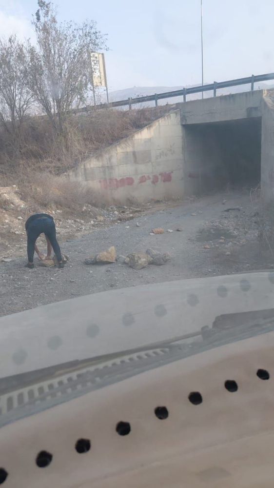 Israeli settlers placed rocks this morning to shut down the road leading to a Palestinian family's home in the town of Burin, north of the occupied West Bank.