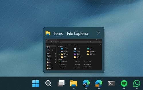 The windows taskbar, hovering over the file explorer icon so a preview thumbnail displays 