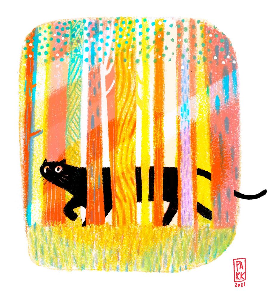 A jet black panther hides within a multicolored forest