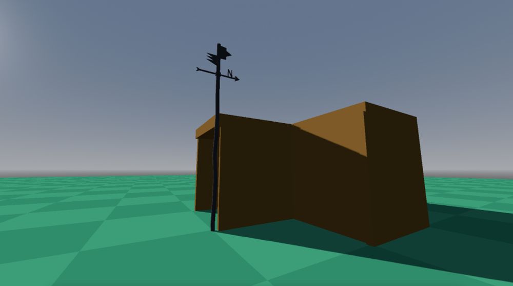 Prototyping the first map with very basic shapes as a placeholder for buildings. We can also see a vane pointing north, attached to the building