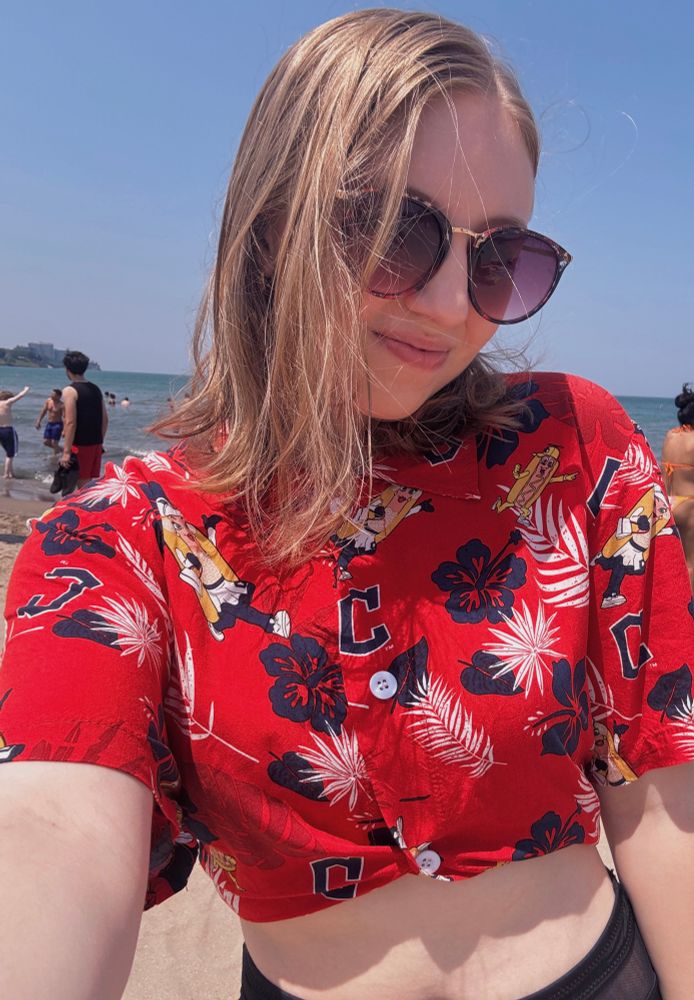 Alys wearing a Guardians Hawaiian shirt at one of Cleveland’s beaches