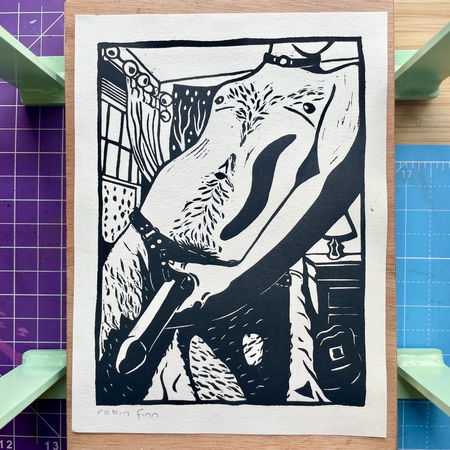 Block print of a hairy transmasculine person wearing a strap on and holding the dildo suggestively.
