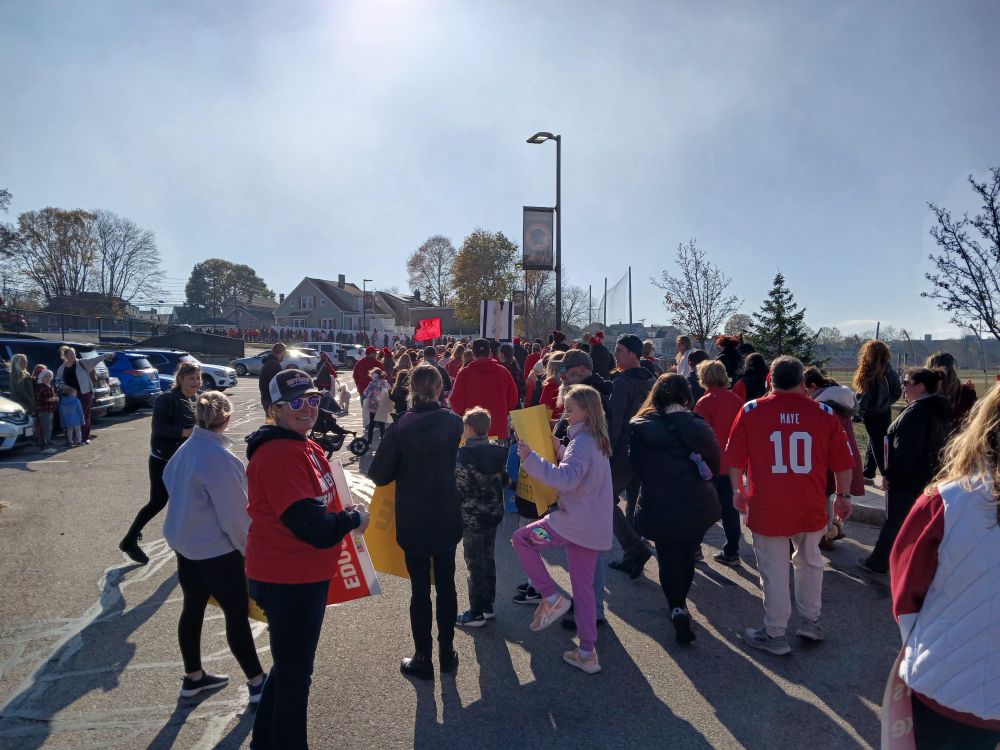 Striking teachers and students marching on sunny but frigid day in Beverly 