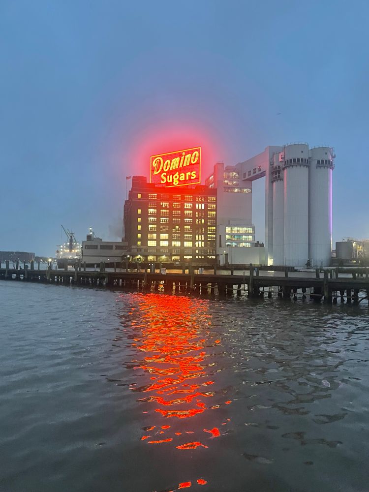 Domino Sugar plant, reflected in the water. 