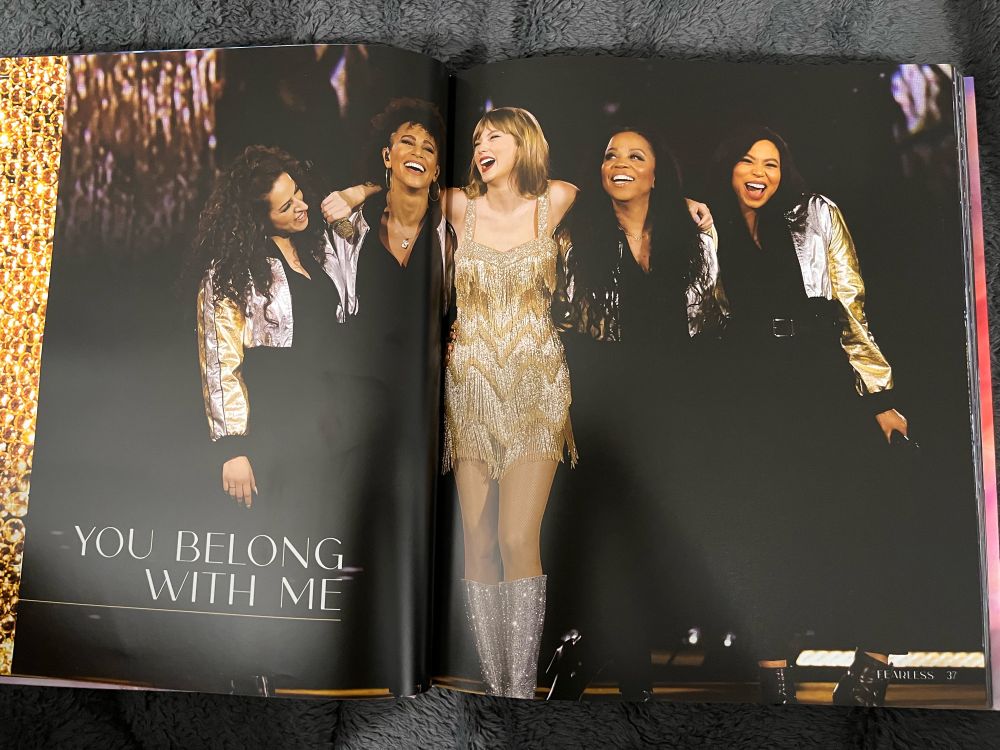 A photo of Taylor Swift and her background vocalists