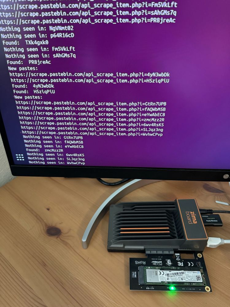 Zima board computer with external nvme drive. On the screen there is code output from a python script.