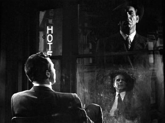 Dick Powell looking out a window and seeing his and another man’s reflection in MURDER, MY SWEET