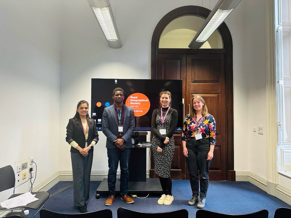 four presenters from the PGF midterm standing together at the Royal Geographical Society