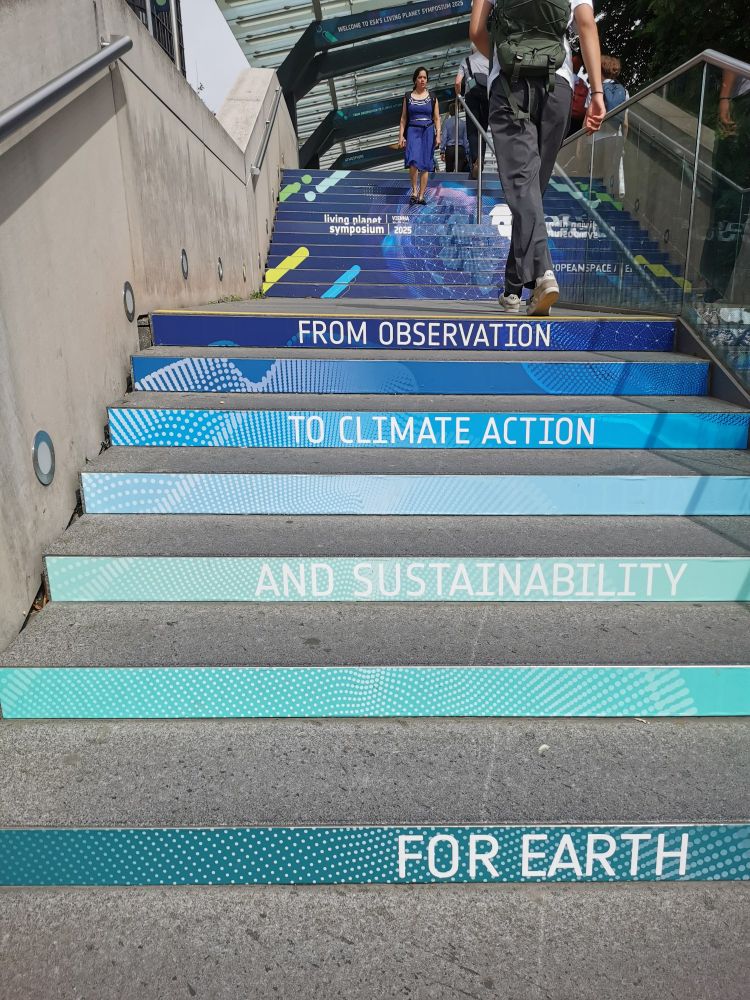 Austria Conference Centre steps with #LPS25 colourful adverts for the event