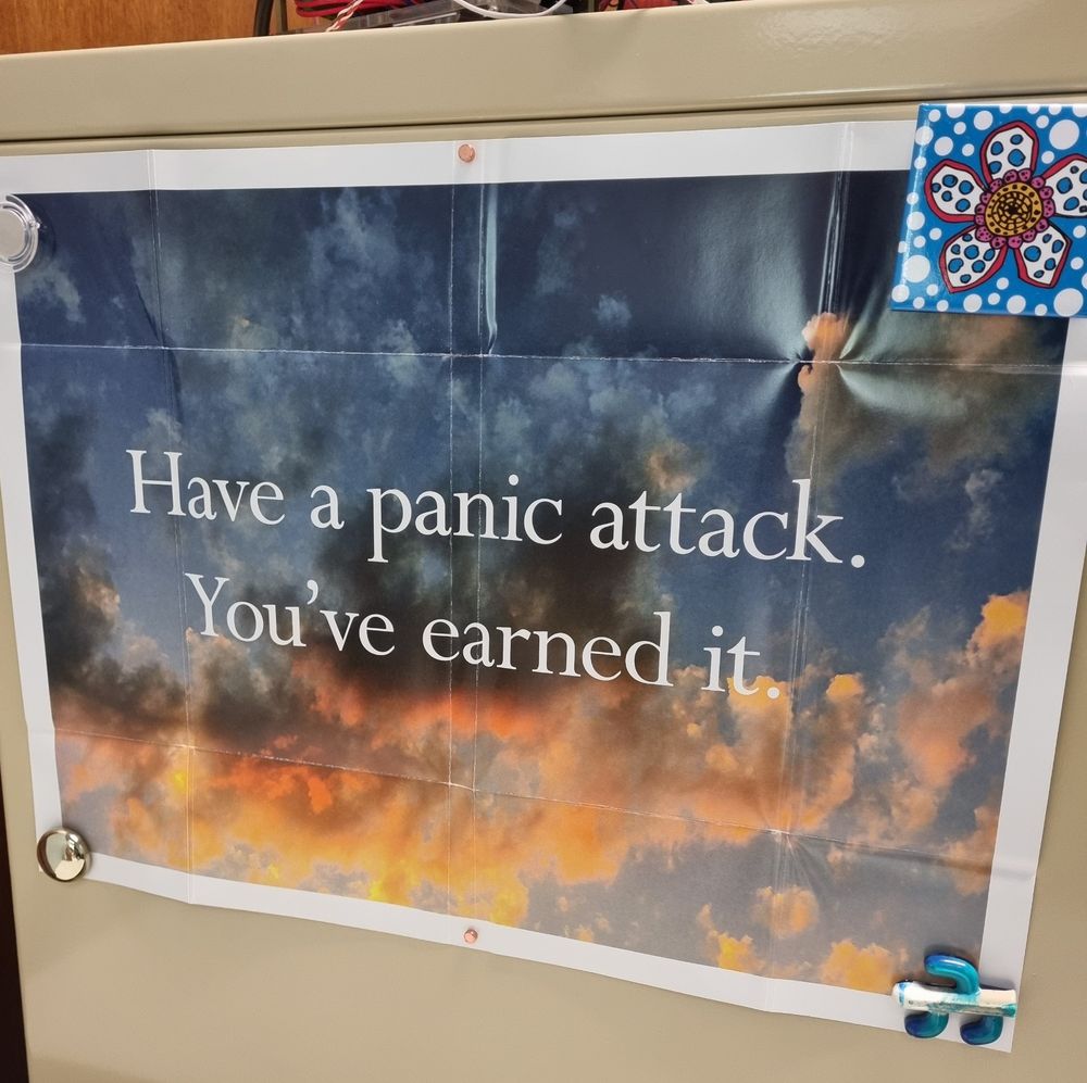 Poster that says "have a panic attack. You've earned it."