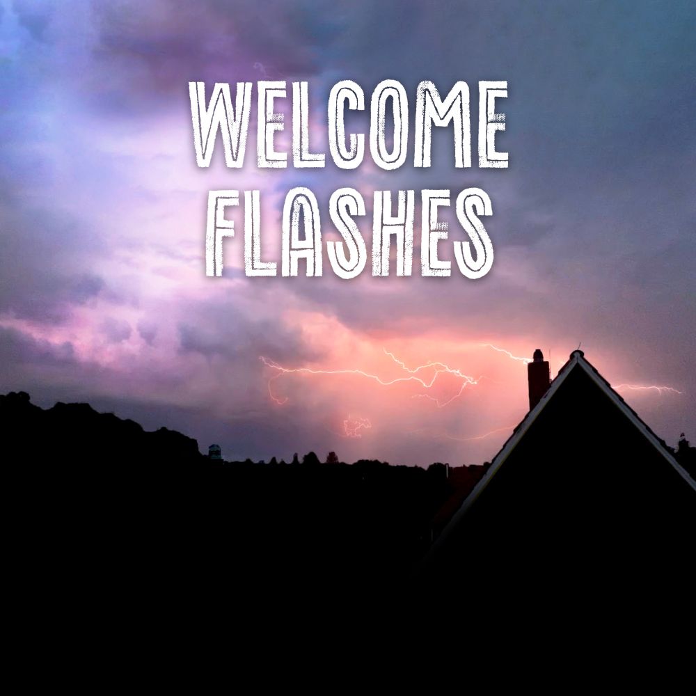Dark sky with colourful lightning, in front of it a black silhouette of houses
