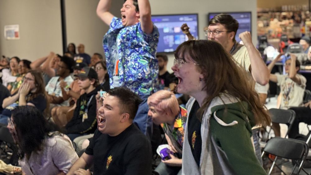 A crowd watching the last match of grand finals at H-Town Splashdown. Shown is their reaction the moment one team won the set. Notably, the half closer to the picture is popping off, and one person is literally jumping out of their seat.

That person is me. I jumped out of the seat.

Looking forward to more hype Splatoon sets in Houston, as soon as I can find the time to come back again.
