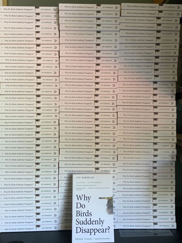 120 copies of Why Do Birds Suddenly Disappear, in three tall columns, with one copy propped up in front of them.