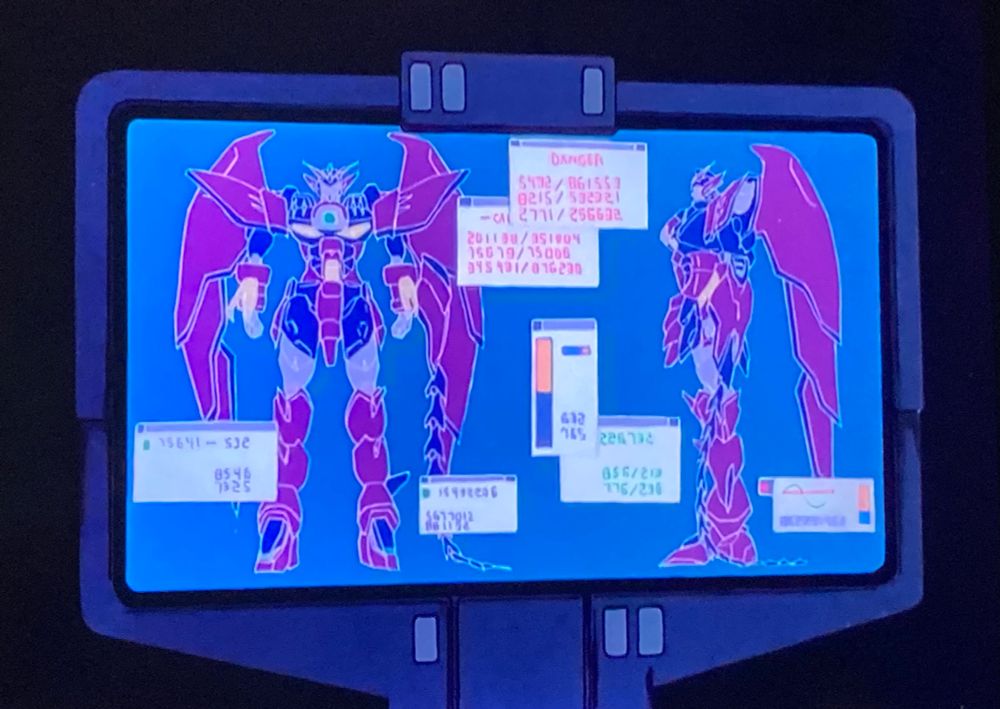 Screenshots of Gundam Wing mock user interface art imagery from the show. Epyon gundam diagram