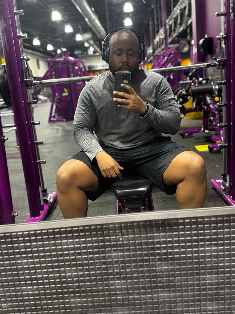 Gym Selfie, Black man wearing Grey Shirt black shorts