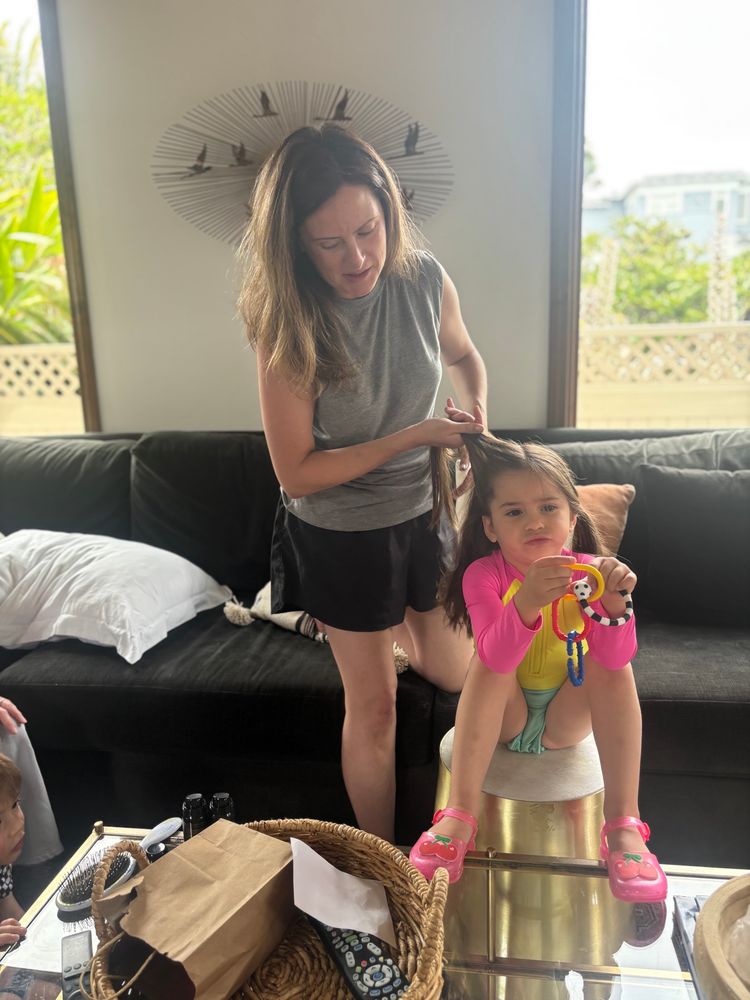 Amanda doing Olivia’s hair 