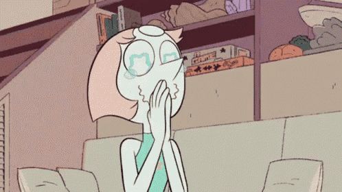 Pearl looking down with a smile and teary eyes