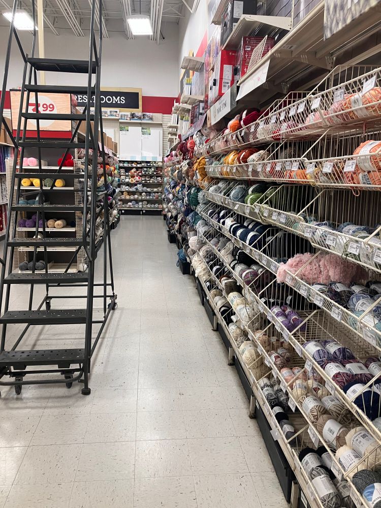 Another photo of the yarn aisle at a Michael’s store