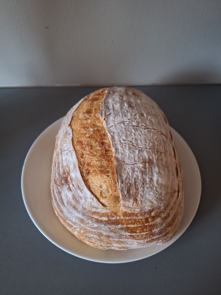 Photo of a loaf of rustic bread.