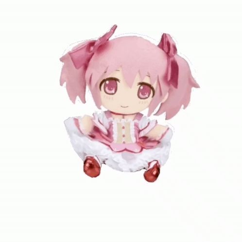 a doll with pink hair and red shoes is sitting on a white background