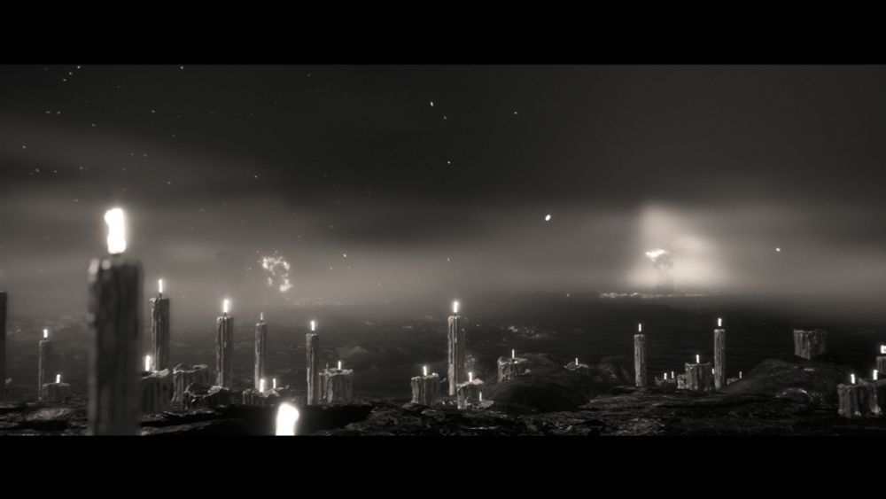 Black and white images of candles on the ground from the game