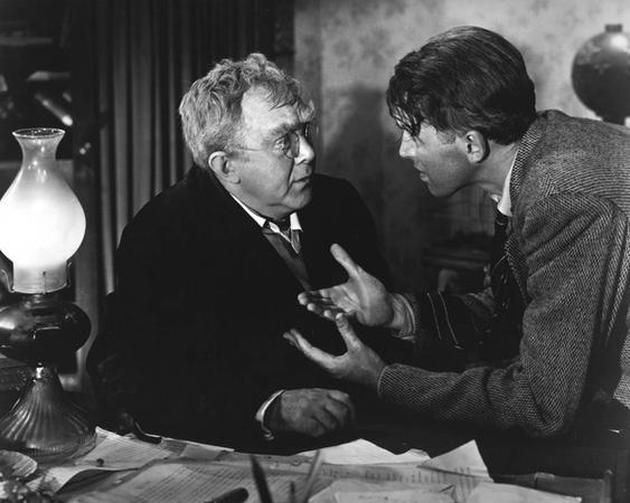 Thomas Mitchell as Uncle Billy is confronted by George Bailey (James Stewart) in the immortal IT'S A WONDERFUL LIFE.