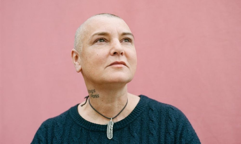 Headshot of Sinead O'connor looking away from the camera