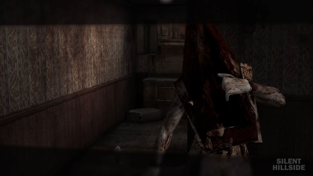 Pyramid Head opening the front of the helmet with his hand in the apartments' closet scene.