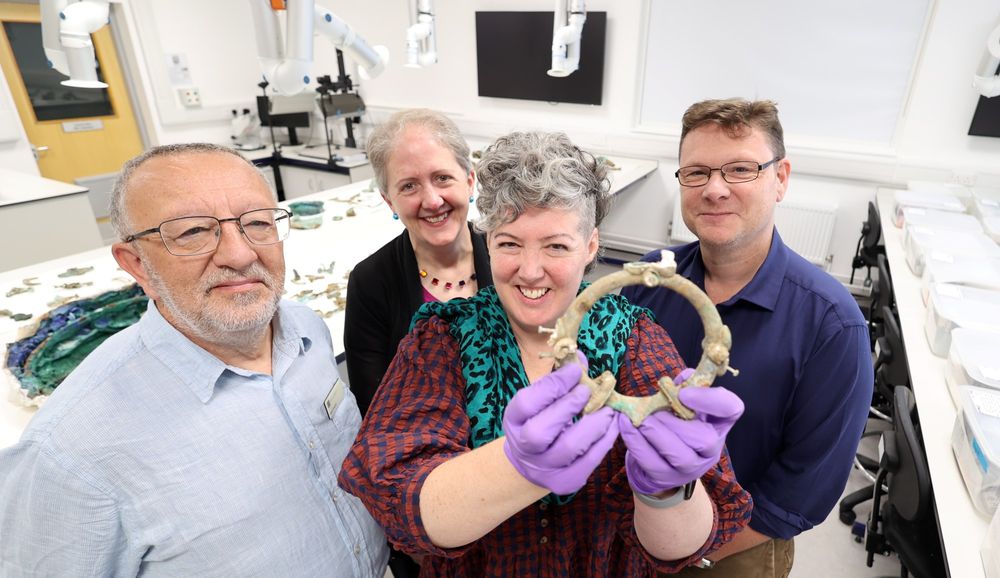 L-R Keith Emerick, Emily Williams, Sophia Adams and Tom Moore. Sophia holds one of the metalwork finds.