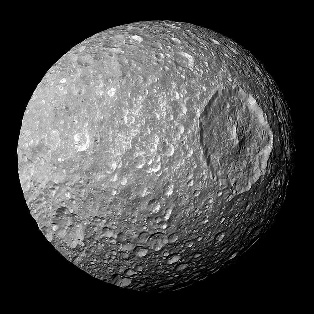 Mimas, a moon of Saturn. It has a comically large (86 mi) crater in its surface
