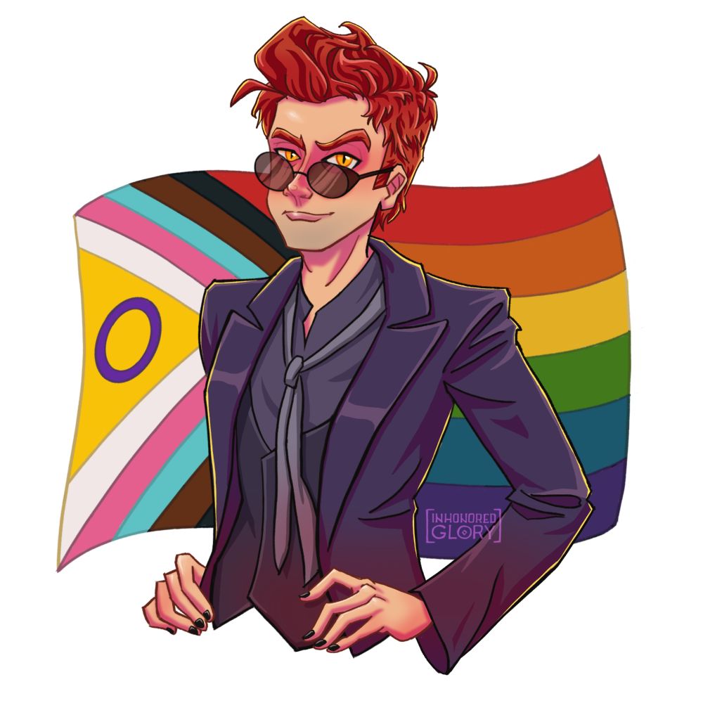 Crowley posing in front of a progress pride flag, hands on hips and looking sassy
