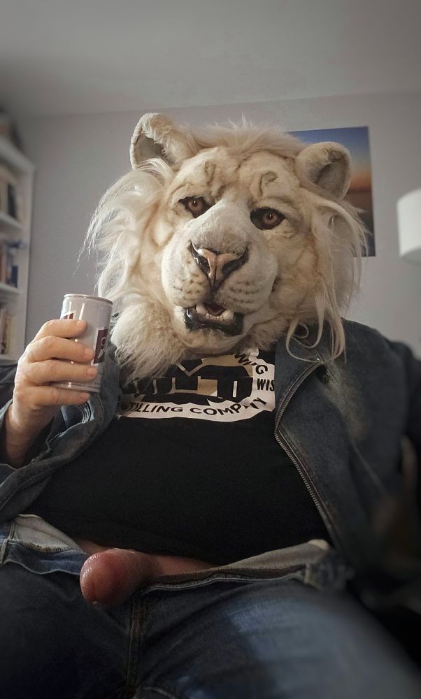 Ghost, a white lion, lounging with his dick out, and holding an empty beer. Won't you get him another one?