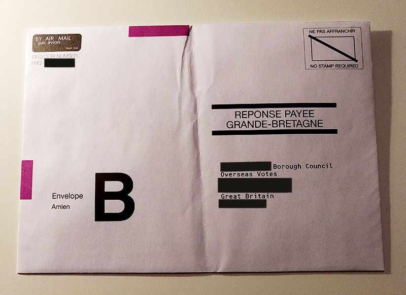 A UK postal vote envelope
