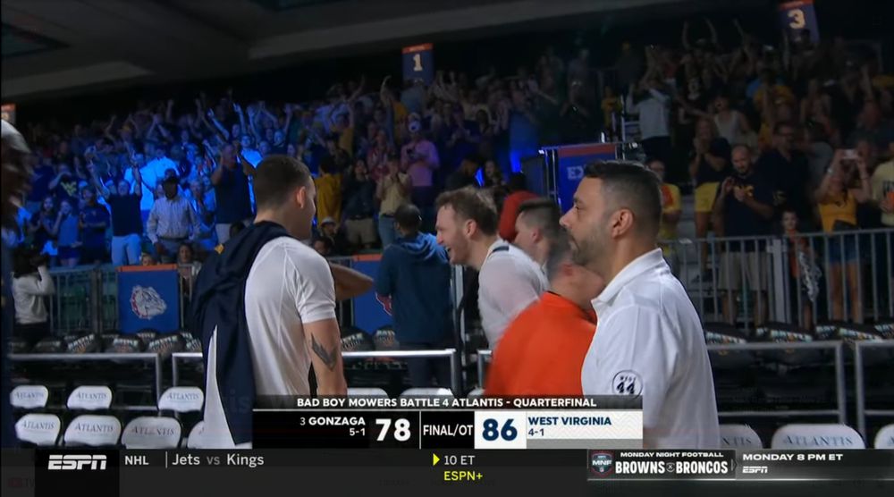 Tucker DeVries celebrates a WVU win over Gonzaga