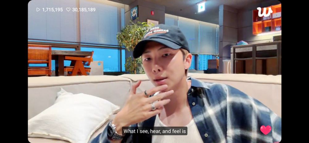Screenshot of Namjoon speaking during a live. He's saying "what i see, hear and feel is" because he was so in his feels tonight