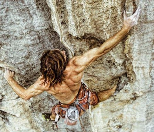 Climber Chris Sharma reaching for a pinch with his right hand. Notice those bulging muscles?  Yeah, Jungkook would totally rock this look.