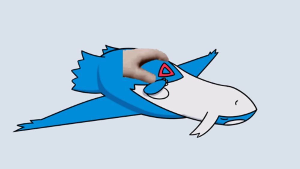 a cartoon drawing of a blue and white fish with a red triangle on its tail