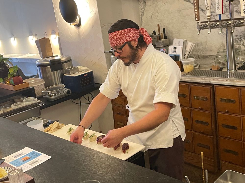 Chef Guerra preparing the first set of hand rolls.