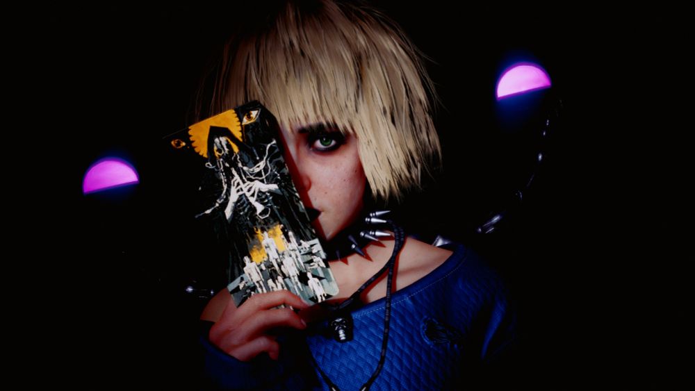 Cyberpunk 2077 screenshot of Misty Olszewski holding the Judgement tarot card. The room she is in is completely dark with the two magenta orbs behind her.