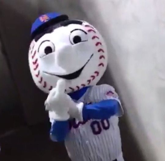 Mr. Met giving the finger.
