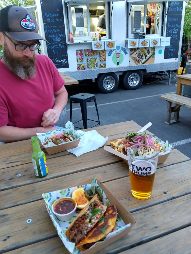Pints and tacos on a table