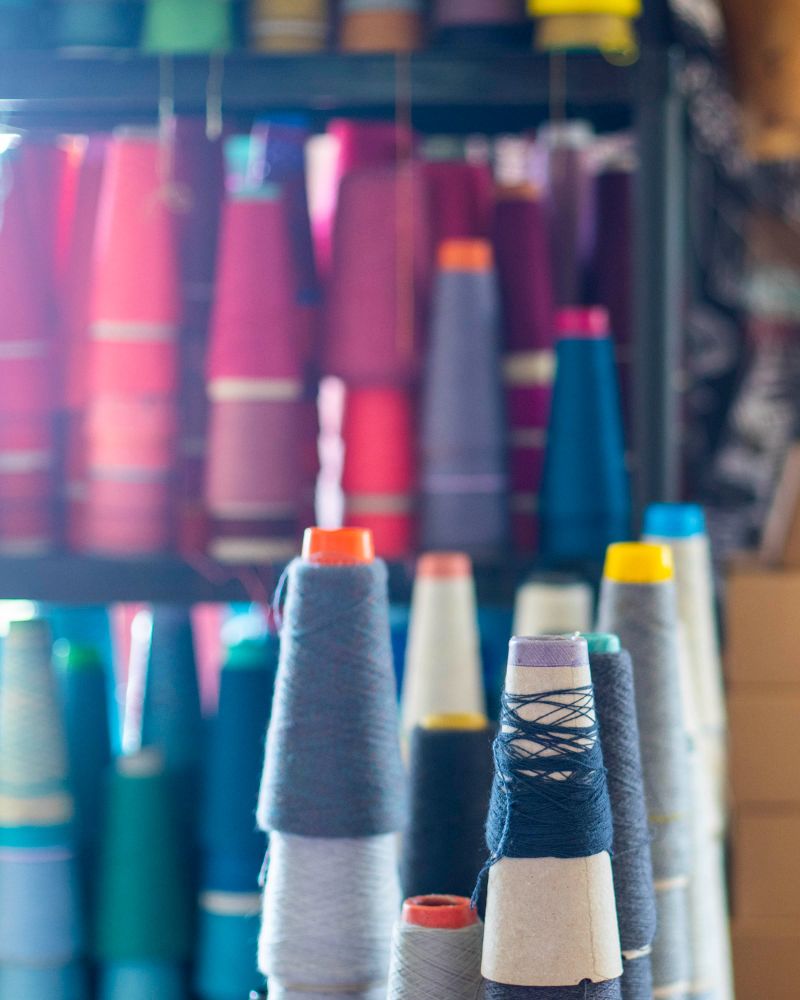 Cones of yarn in the Nielanell knitwear workshop, Shetland