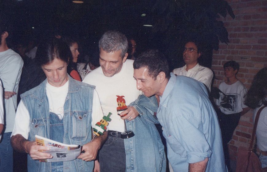 foto de Angeli, Glauco e Laerte numa entrega de prêmio HQMix em 1994