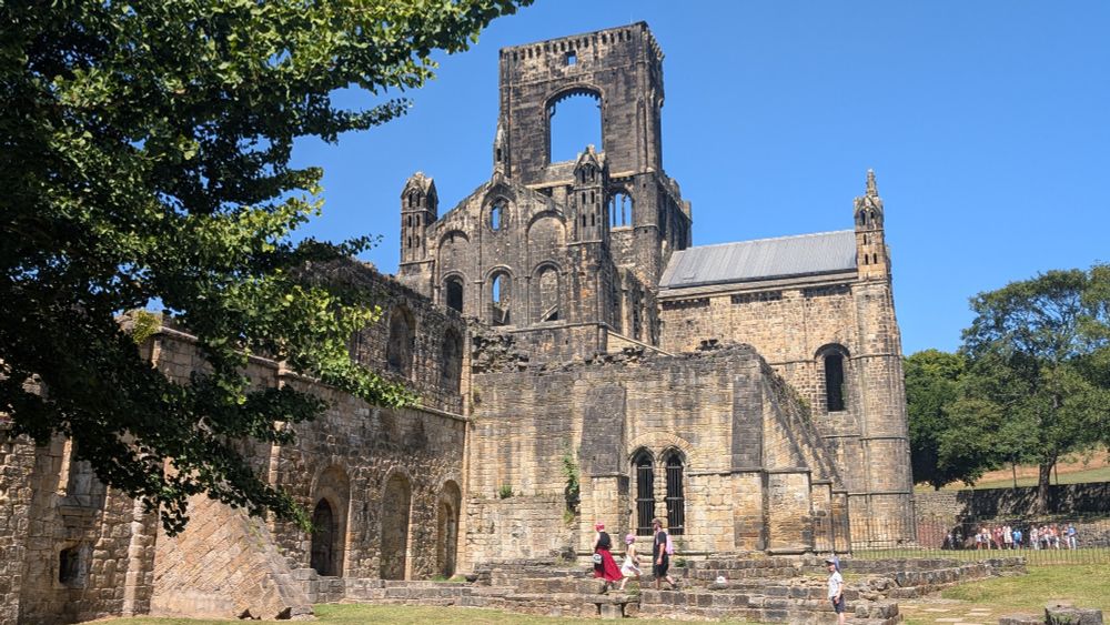 A view of the exterior of the main church, still standing a few storeys high.