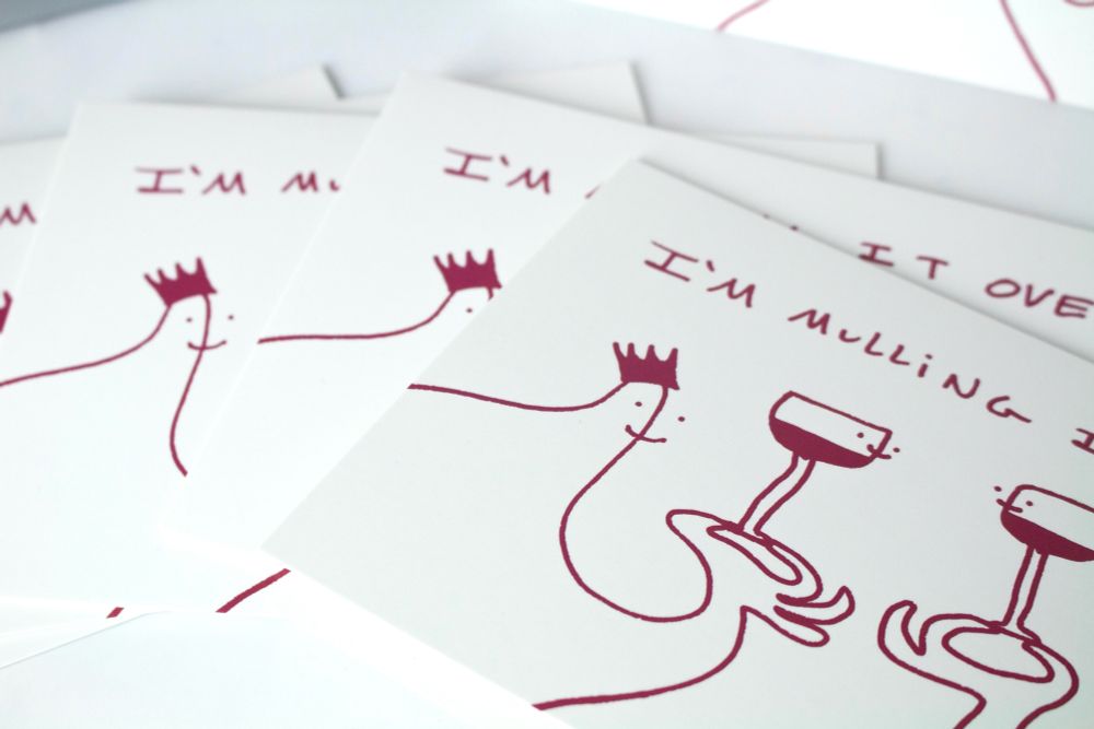 A close up of a pile of Mulling it Over cards