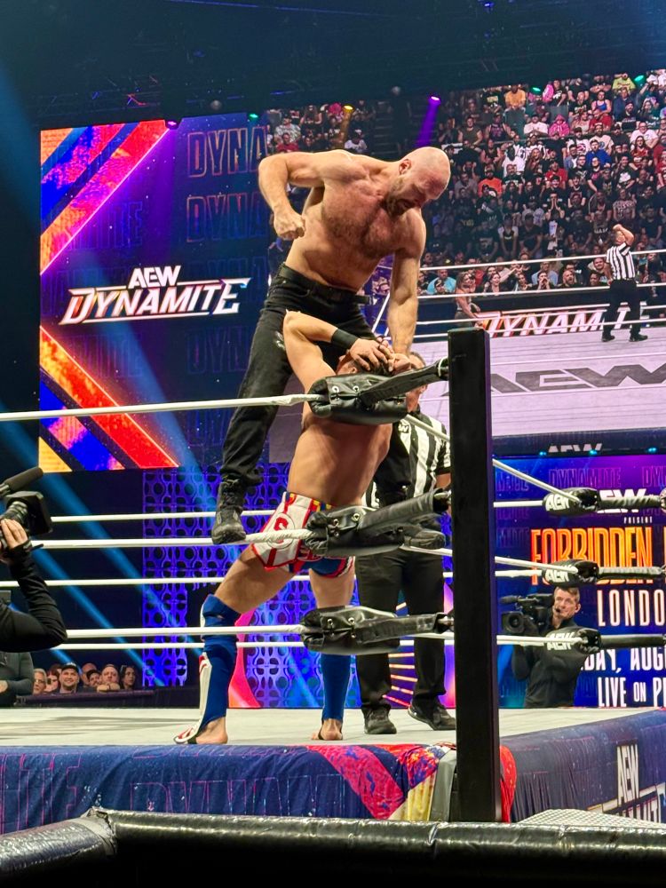 Jon Moxley stands on the turnbuckle and punches Speedball Mike Bailey at AEW Dynamite.