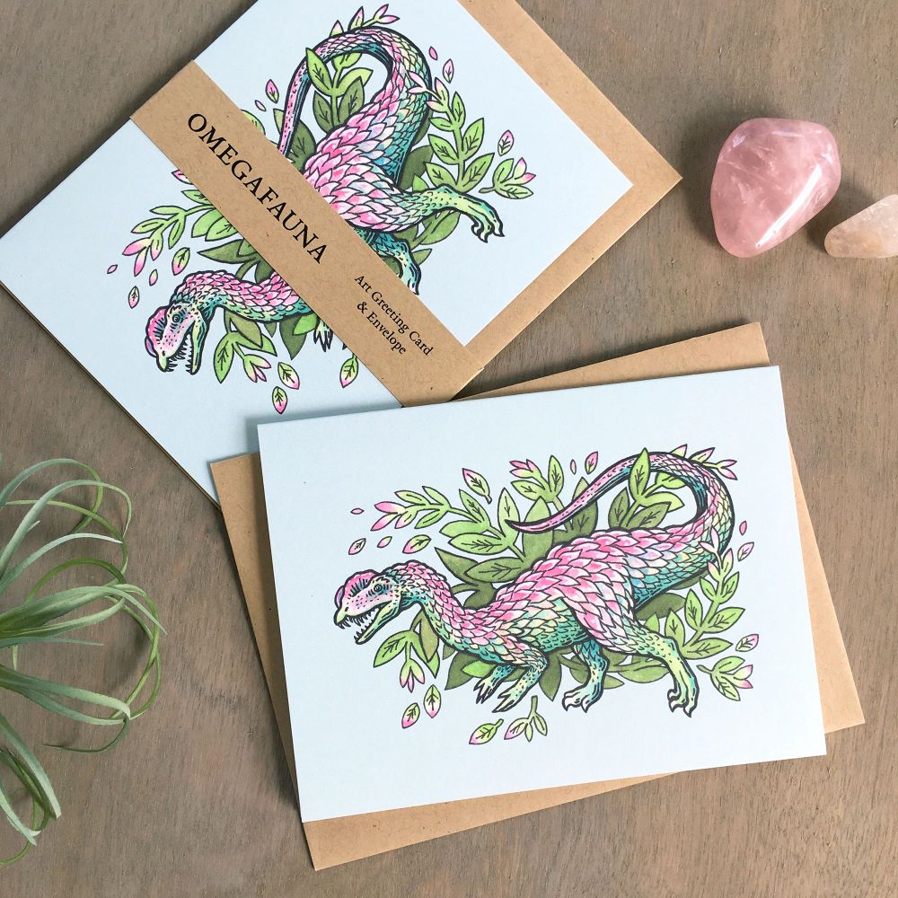 Art greeting cards featuring a botanical dilophosaurus illustration.